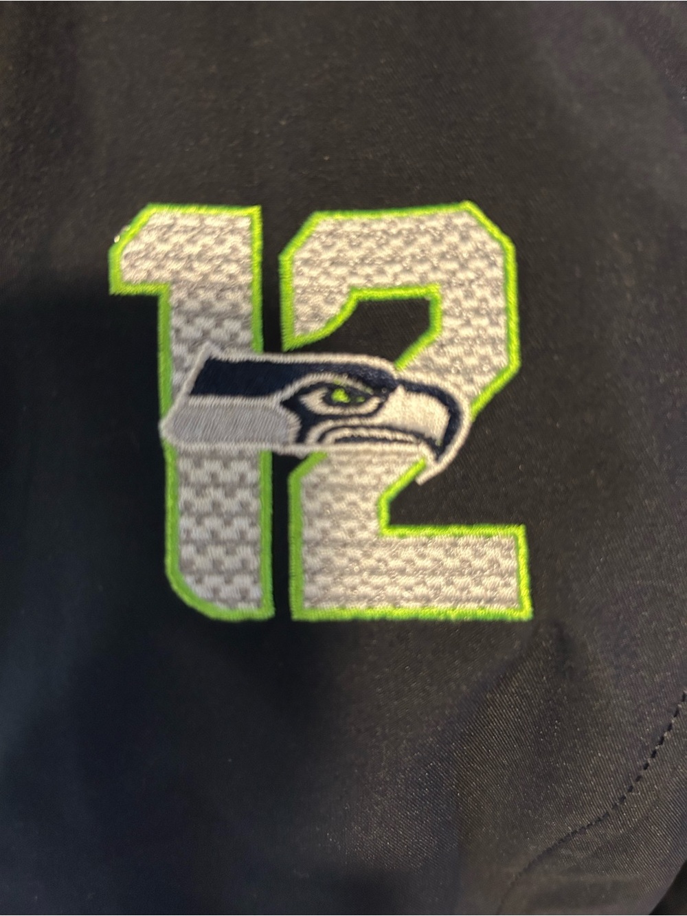 Seahawks woman’s Black Jacket with Neon Green 12 Logo